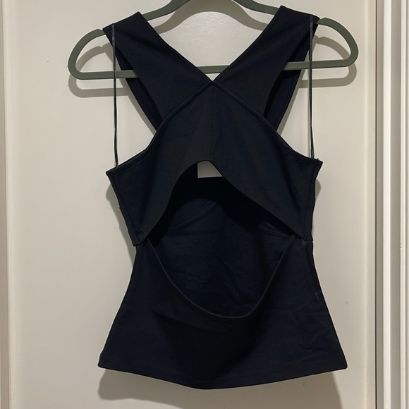 NEW H&M black shirt. Open on the back. Size small - Picture 3 of 3